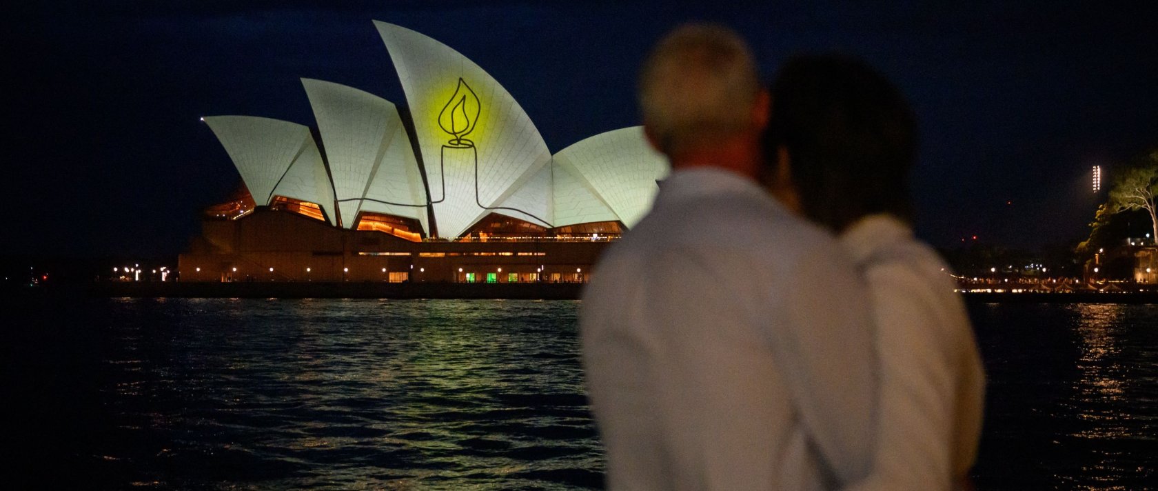 The Sydney Opera House is illuminated with candlelight in Sydney, Australia, Dec. 21, 2025. (AFP Photo)