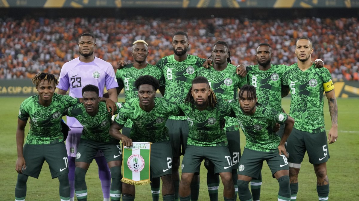 The Nigeria team pose for a group photo before the African Cup of Nations final match against the Ivory Coast, at the Olympic Stadium of Ebimpe, Abidjan, Ivory Coast, Feb. 11, 2024. (AP Photo)