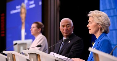 European Commission President Ursula von der Leyen (R) speaks as European Council President Antonio Costa (C) and Denmark's Prime Minister Mette Frederiksen listen after a European Council meeting, Brussels, Belgium, Dec. 19, 2025. (AFP Photo)