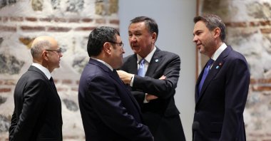 Energy and Natural Resources Minister Alparslan Bayraktar (R) and Uzbekistan's Energy Minister Jurabek Mirzamakhmudov chat on the sidelines of the fifth meeting of the energy ministers of the Organization of Turkic States (OTS), Istanbul, Türkiye, Dec. 10, 2025. (AA Photo)