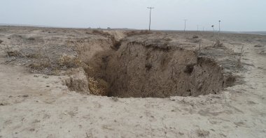 An empty sinkhole formed by ground subsidence in the Konya Closed Basin, Türkiye, Dec. 22, 2025. (DHA Photo)