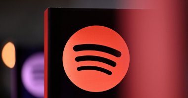 A Spotify logo is pictured at the 77th Frankfurt book fair, the world's biggest trade fair for books, in Frankfurt am Main, western Germany, Oct. 17, 2025. (AFP Photo)