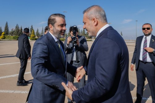 Syrian Foreign Minister Asaad al-Shaibani (L) welcomes Foreign Minister Hakan Fidan (R) at the airport, Damascus, Syria, Dec. 22, 2025. (AA Photo)