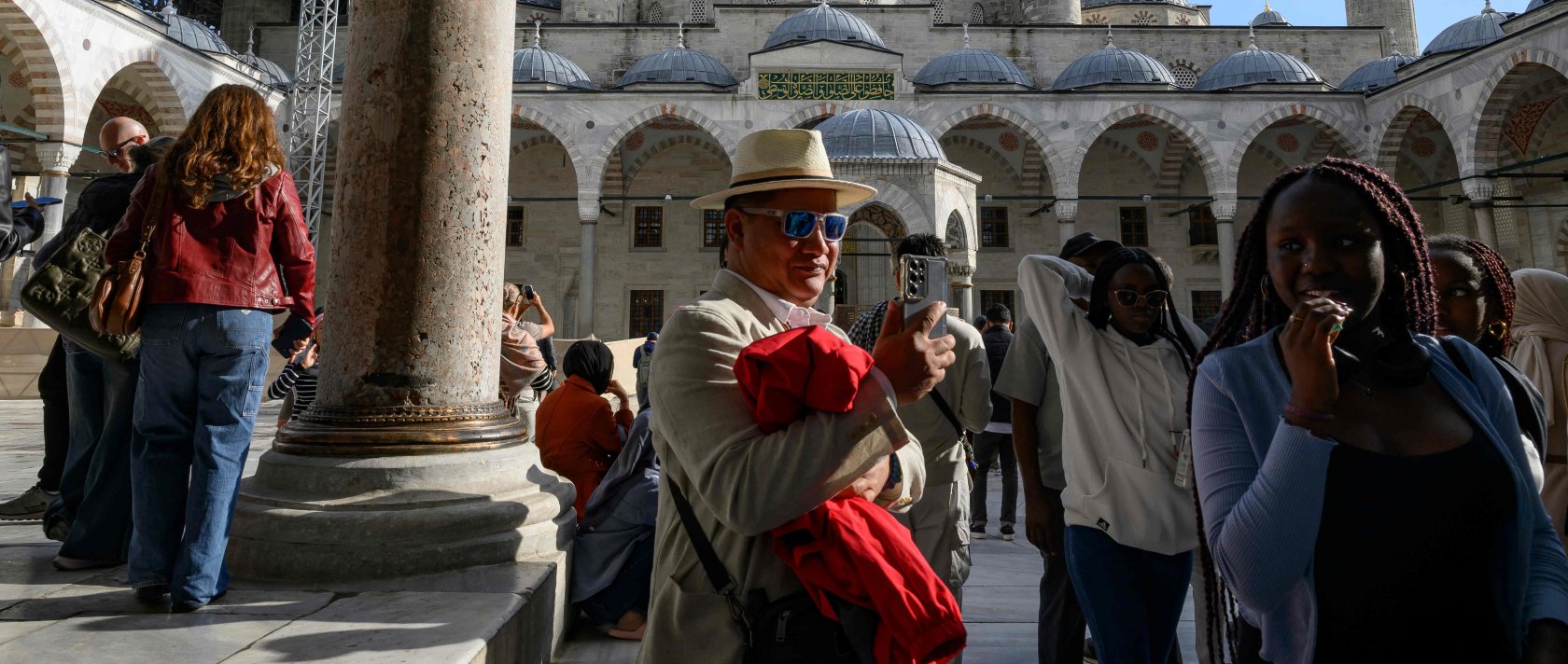 Tourists visit Sultanahmet Mosque, also known as the Blue Mosque, Istanbul, Türkiye, Nov. 24, 2025. (AFP Photo)