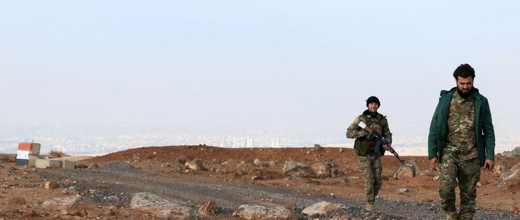 Soldiers from the Syrian Ministry of Defense tour an abandoned military base, once considered to be the largest Iranian military base in Syria, on the southern outskirts of Aleppo, in the Jabal Azzan area, Dec. 4, 2025. (AFP File Photo)