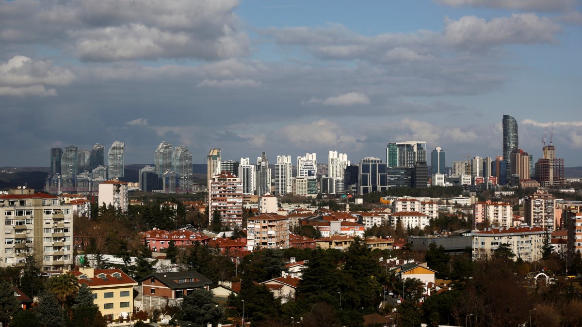 Skyscrapers in the Maslak business and financial district are seen behind the residential apartment blocks in Istanbul, Türkiye, Jan. 23, 2020. (Reuters Photo)
