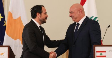 Lebanese President Joseph Aoun (R) shakes hands with Greek Cypriot administration head Nikos Christodoulides at the end of their joint press conference, Beirut, Lebanon, Nov. 26, 2025. (AFP Photo)