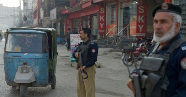 This file photo shows Pakistani Police officers standing guard at a checkpoint in Peshawar, Khyber Pakhtunkhwa, Pakistan, Nov. 25, 2025. (EPA Photo)