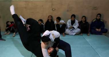 Wrestlers Nadia Mahmoud and Rodaina Gamal in action during their training session at the one-room Manshiya club, El Mansoura, Egypt, Dec. 15, 2025. (Reuters Photo)