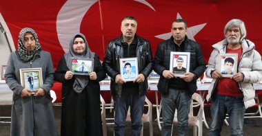 Families who began a sit-in protest in front of the former DEM Party Diyarbakır Provincial Headquarters ask that the committee formed for the terror-free Türkiye process listen to them as well, Diyarbakır, Türkiye, Dec. 25, 2025. (İHA Photo)