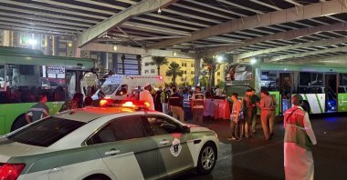 Ambulances stand outside a hospital following the shuttle bus accident, Mecca, Saudi Arabia, Dec. 23, 2025. (IHA Photo)