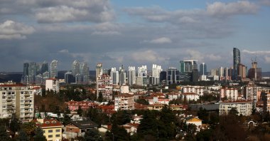 Skyscrapers in the Maslak business and financial district are seen behind the residential apartment blocks in Istanbul, Türkiye, Jan. 23, 2020. (Reuters Photo)