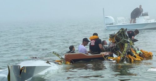 Authorities and volunteers respond to a Mexican Navy plane crash near Galveston, Texas, Dec. 22, 2025. (AP Photo)