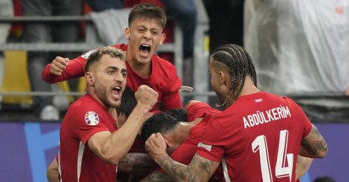 Türkiye's players celebrate after Mert Muldur's goal during a Group F match against Georgia at the Euro 2024 tournament, Dortmund, Germany, June 18, 2024. (AP Photo)