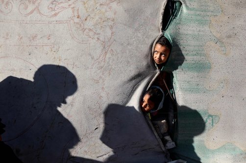 Children look on from a shelter in the Nuseirat camp for displaced Palestinians in the central Gaza Strip, Palestine, Dec. 22, 2025. (AFP Photo)