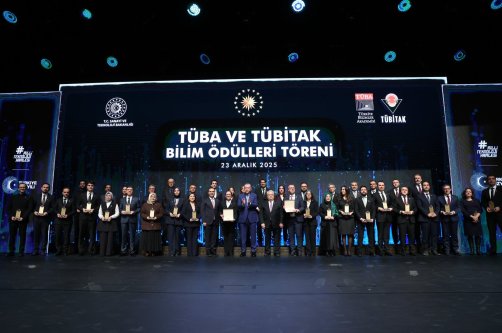 President Recep Tayyip Erdoğan poses for a family photo with award recipients after the TÜBA and TÜBİTAK Science Awards ceremony, Ankara, Türkiye, Dec. 23, 2025. (AA Photo)
