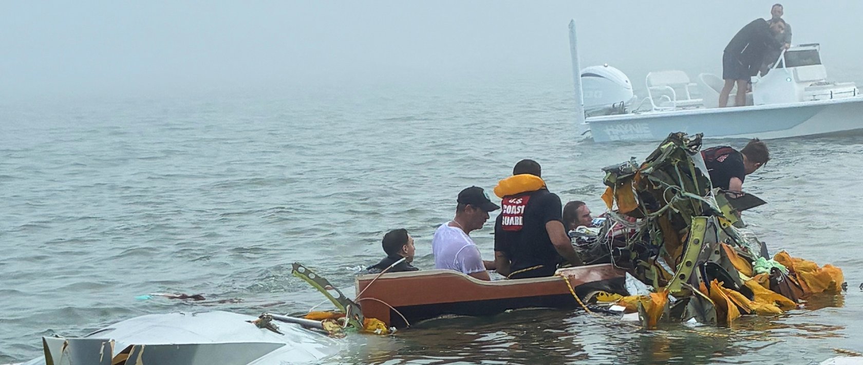 Authorities and volunteers respond to a Mexican Navy plane crash near Galveston, Texas, Dec. 22, 2025. (AP Photo)