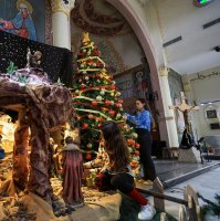 Palestinian Christian girls decorate the Holy Family Church, as the community prepares modest Christmas celebrations after two years of war, in Gaza City, Palestine, Dec. 9, 2025. (Reuters Photo)