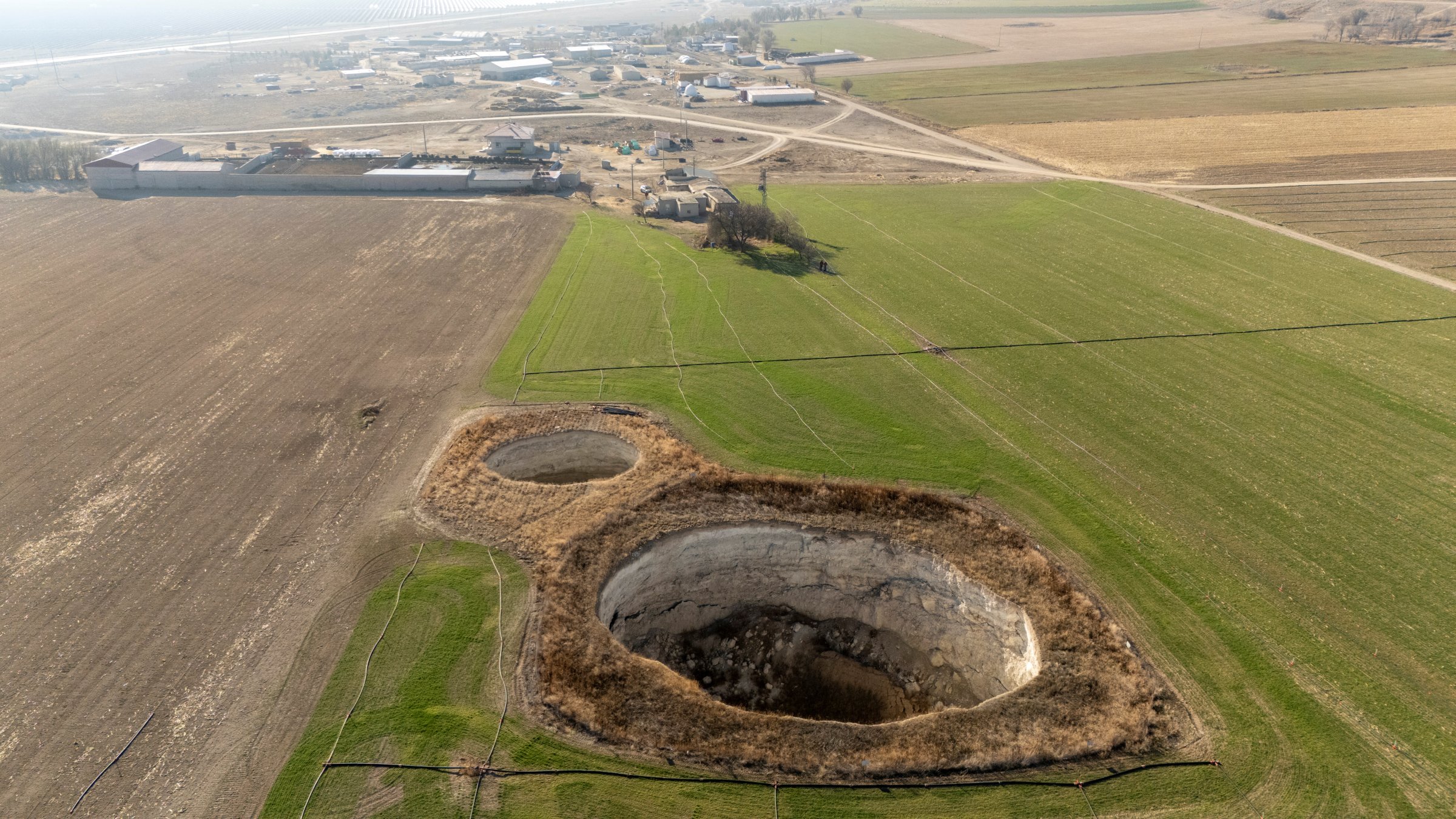 A drone view shows sinkholes formed in the middle of a farmland in Konya province, Türkiye, Dec. 18, 2025. (Reuters Photo)