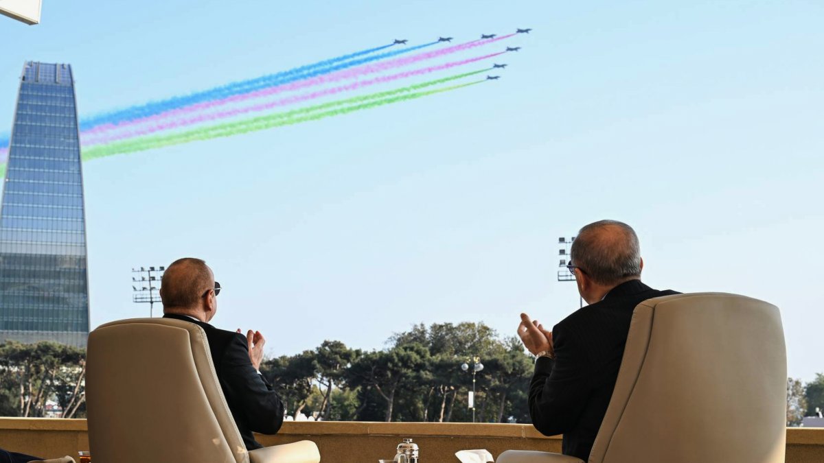 Azerbaijani President Ilham Aliyev (L) and President Recep Tayyip Erdoğan watch a military parade, Baku, Azerbaijan, Nov. 8, 2025. (AP Photo)