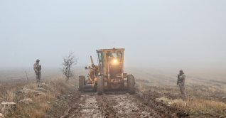Soldiers patrol as search and rescue operations continue at the wreckage site following the crash of a Libya-bound business jet carrying Libyan Chief of Staff General Muhammad Ali Ahmed Al-Haddad, found 2 kilometers south of Kesikkavak Village at Haymana district in Ankara, Türkiye, Dec. 24, 2025. (AFP Photo)