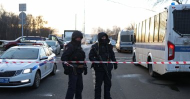 Law enforcement officers block the road near the scene where two traffic police officers and another person were killed in a blast in Moscow, Russia, Dec. 24, 2025. (Reuters Photo)