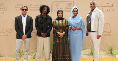 (L to R) Phil Cox, Ibrahim Snoopy, Doha Film Institute CEO Fatma Al Remaihi, Rawia Alhag and Talal Afifi attend "Khartoum" red carpet during the Doha Film Festival 2025, Doha, Qatar, Nov. 24, 2025. (Getty Images Photo)