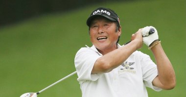 Japanese golfer Masashi "Jumbo" Ozaki hits his tee shot during the first round of the tour championship golf tournament at Shishido Hills Country Club West Course, Kasama, Ibaraki Prefecture, Japan, June 20, 2013. (AFP Photo)