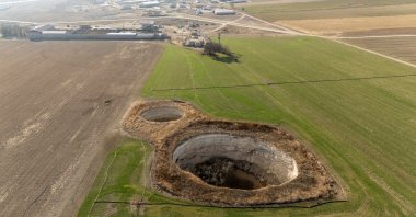 A drone view shows sinkholes formed in the middle of a farmland in Konya province, Türkiye, Dec. 18, 2025. (Reuters Photo)