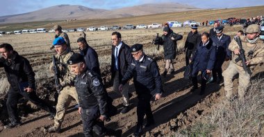 Libyan military delegation members arrive at the wreckage site following the crash of a Libya-bound business jet carrying Libyan Chief of Staff General Muhammad al-Haddad, Ankara, Türkiye, Dec. 24, 2025. (AFP Photo)