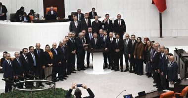 Turkish lawmakers pose for a family photo during the last legislative session of 2025 at the Parliament in the capital, Ankara, Türkiye, Dec. 24, 2025. (AA Photo)