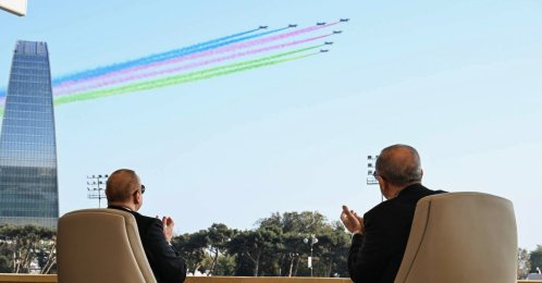 Azerbaijani President Ilham Aliyev (L) and President Recep Tayyip Erdoğan watch a military parade, Baku, Azerbaijan, Nov. 8, 2025. (AP Photo)