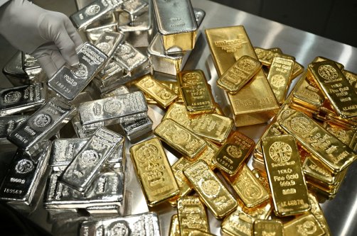 Gold and silver bars are stacked in the safe deposit boxes room of the Pro Aurum gold house in Munich, Germany, Jan. 10, 2025. (Reuters Photo)