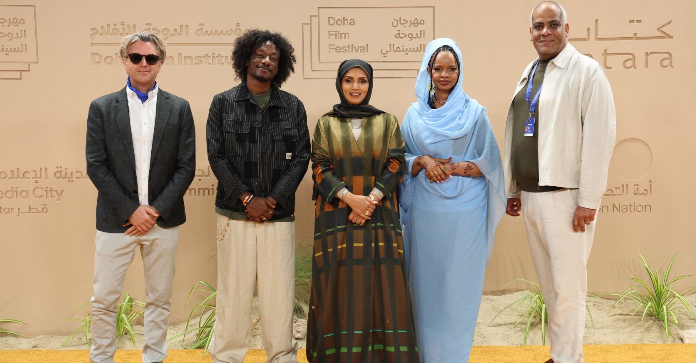 (L to R) Phil Cox, Ibrahim Snoopy, Doha Film Institute CEO Fatma Al Remaihi, Rawia Alhag and Talal Afifi attend "Khartoum" red carpet during the Doha Film Festival 2025, Doha, Qatar, Nov. 24, 2025. (Getty Images Photo)