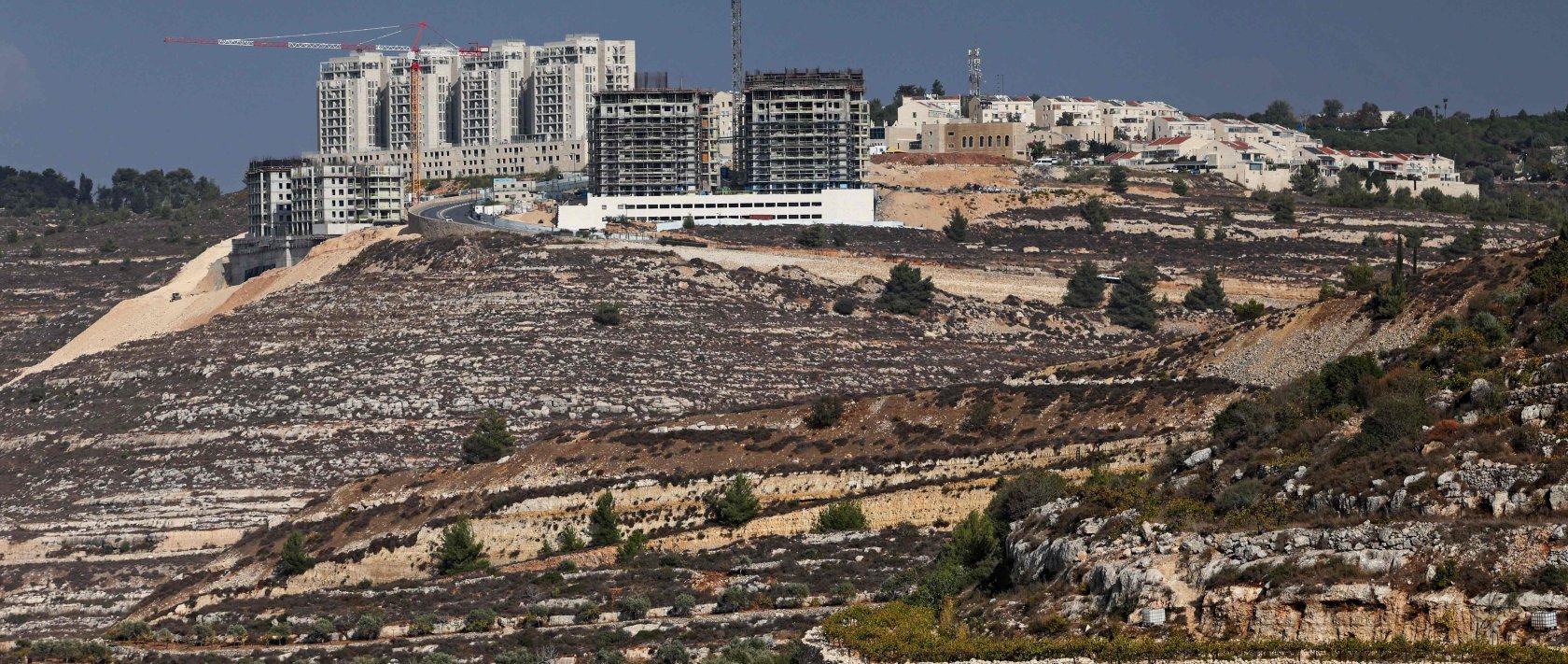 Newly constructed buildings are pictured in the Israeli settlement of Givat Zeev near the Palestinian city of Ramallah in the occupied West Bank, Oct. 24, 2025. (AFP Photo)