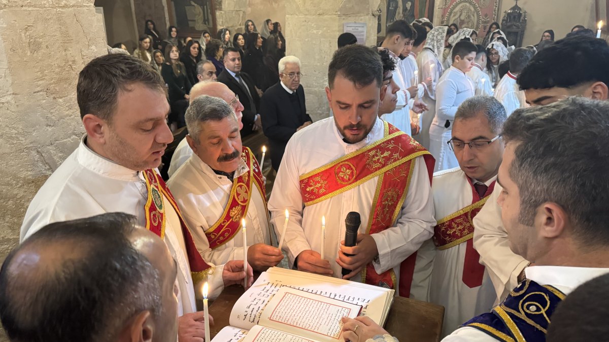 Worshippers gather inside the Forty Martyrs Church as Christians mark Christmas, Mardin, Türkiye, Dec. 25, 2025. (IHA Photo)