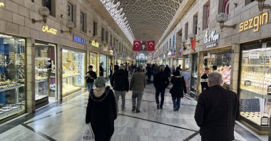 People walk in a bazaar, Bursa, northwestern Türkiye, Dec. 24, 2025. (IHA Photo)