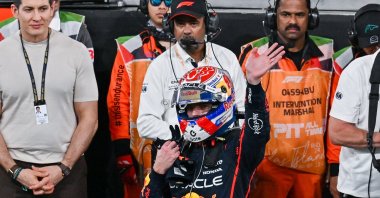 Red Bull’s Dutch driver Max Verstappen (C) celebrates after a win at the Yas Marina Circuit during the Abu Dhabi Grand Prix, Abu Dhabi, UAE, Dec. 8, 2025. (AA Photo)
