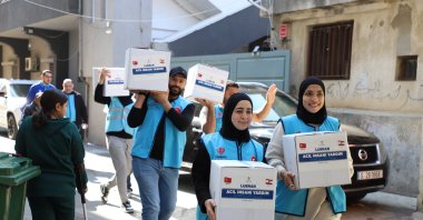 Humanitarian aid packages are distributed by the Turkish Diyanet Foundation team, Gaza, Palestine, Dec. 25, 2025. (AA Photo)