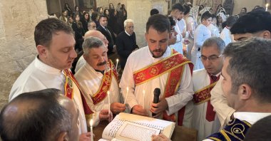 Worshippers gather inside the Forty Martyrs Church as Christians mark Christmas, Mardin, Türkiye, Dec. 25, 2025. (IHA Photo)