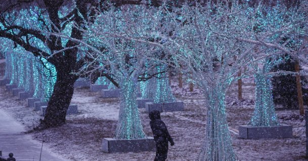 A man looks at a seasonal decoration for the New Year's and Christmas holidays, Moscow, Russia, Dec. 24, 2025. (EPA Photo)