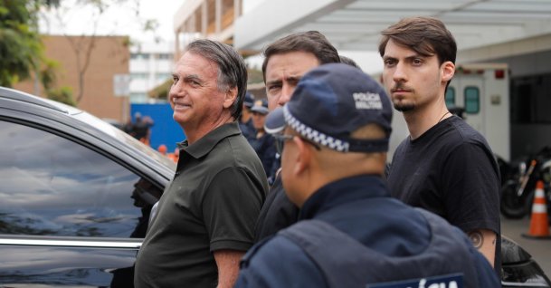 Former Brazilian President Jair Bolsonaro (L) leaves the DF Star hospital, accompanied by his son Jair Renan (R), Brasilia, Brazil, Sept. 14, 2025. (AFP Photo)