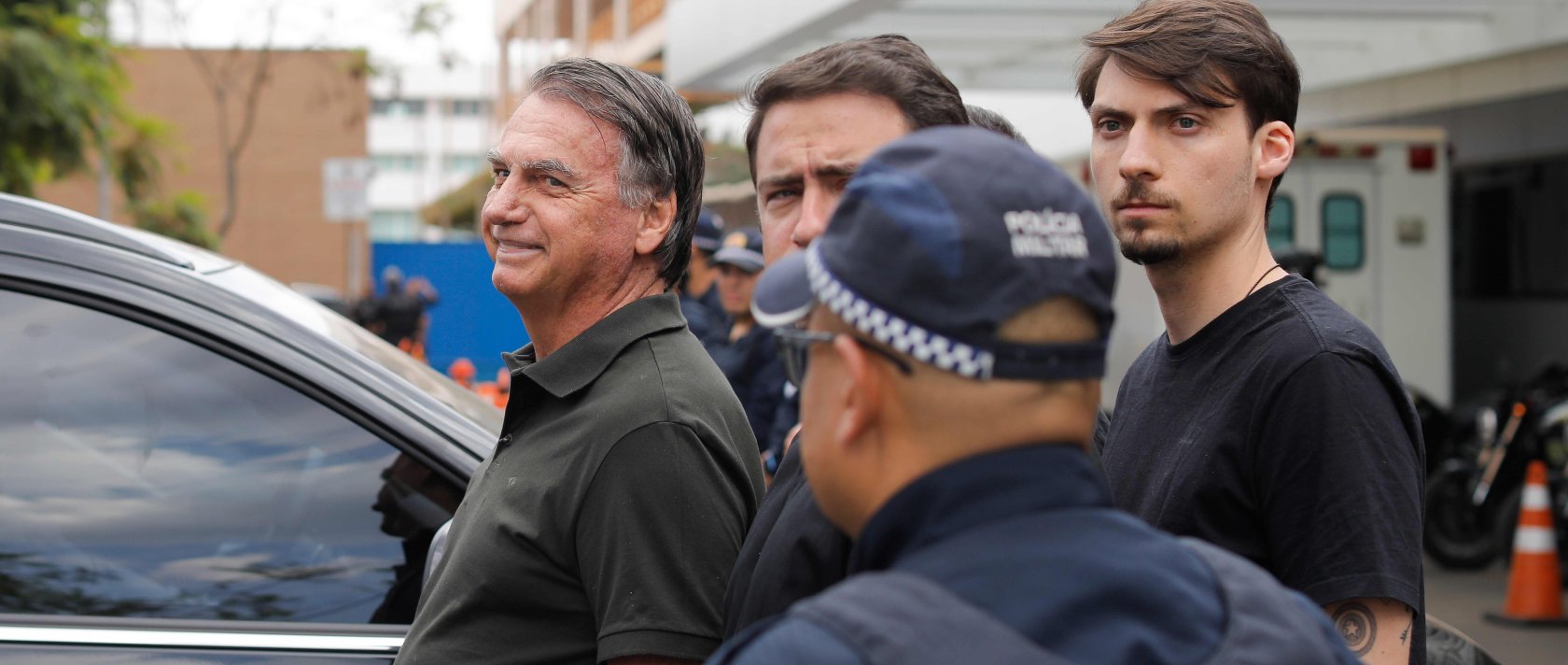 Former Brazilian President Jair Bolsonaro (L) leaves the DF Star hospital, accompanied by his son Jair Renan (R), Brasilia, Brazil, Sept. 14, 2025. (AFP Photo)