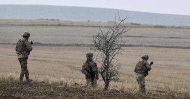 Security forces work at the crash site of a jet carrying Libya's army chief of staff Mohammed al-Haddad, near Kesikkavak village, Ankara, Türkiye, Dec. 25, 2025. (AA Photo)