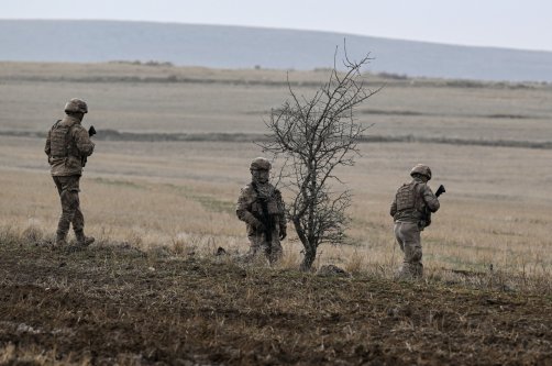 Security forces work at the crash site of a jet carrying Libya's army chief of staff Mohammed al-Haddad, near Kesikkavak village, Ankara, Türkiye, Dec. 25, 2025. (AA Photo)