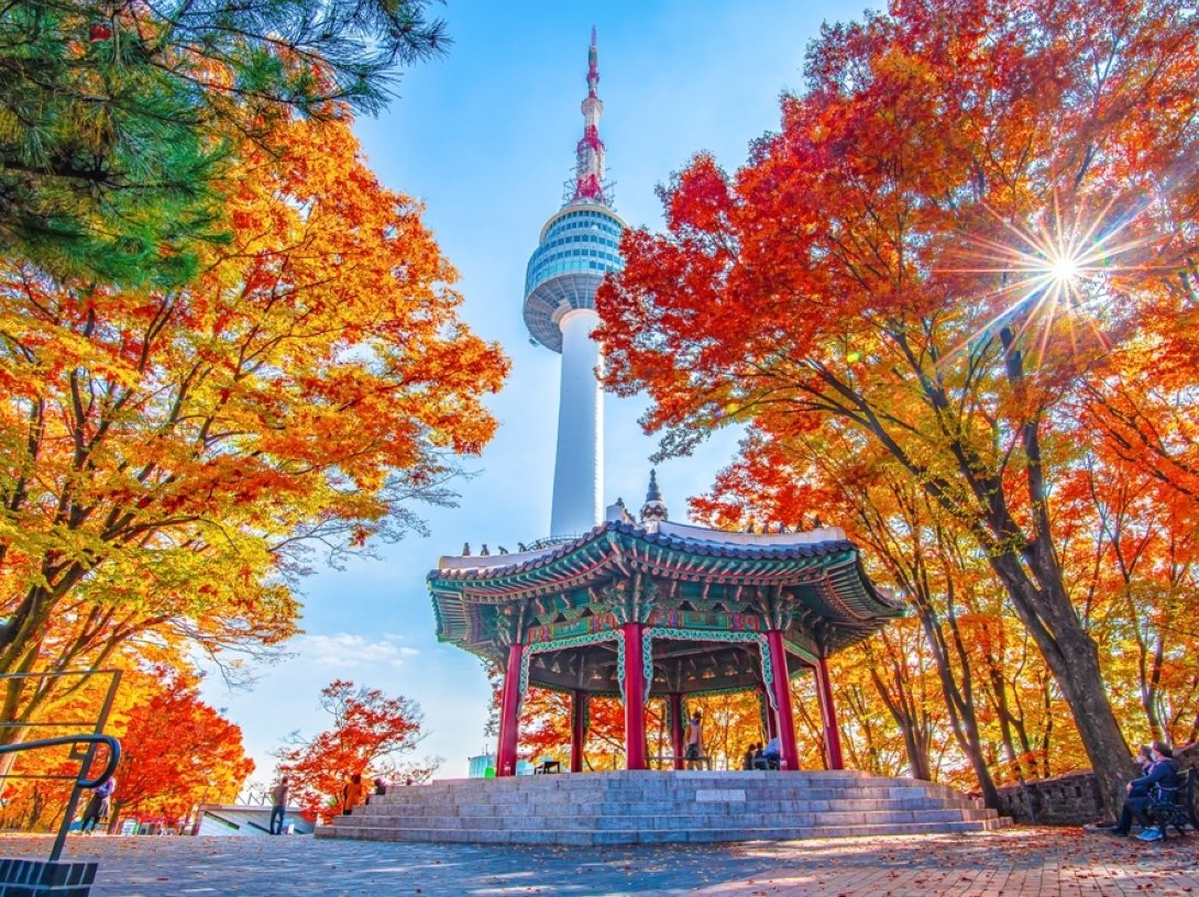 Namsan Tower and pavilion during the autumn leaves, Seoul, South Korea. (Shutterstock Photo)