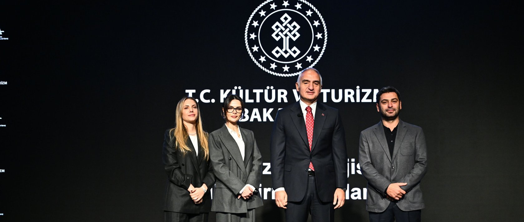 Culture and Tourism Minister Mehmet Nuri Ersoy (C), Eda Eca (L), Sinem Ünsal (2nd L) and Ozan Akbaba pose for a photo at a press conference held at the Atatürk Cultural Center (AKM), Istanbul, Türkiye, Dec. 26, 2025. (AA Photo)