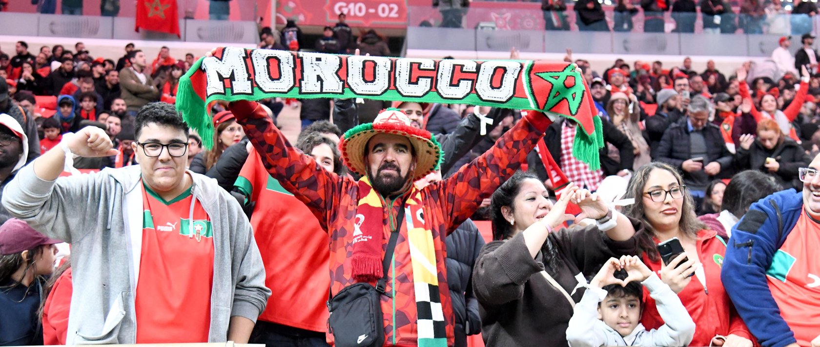 Moroccan fans wave national flags in the stands during the opening match of the Africa Cup of Nations (AFCON) against Comoros at Prince Moulay Abdellah Stadium, Rabat, Morocco, Dec. 21, 2025. (AA Photo)
