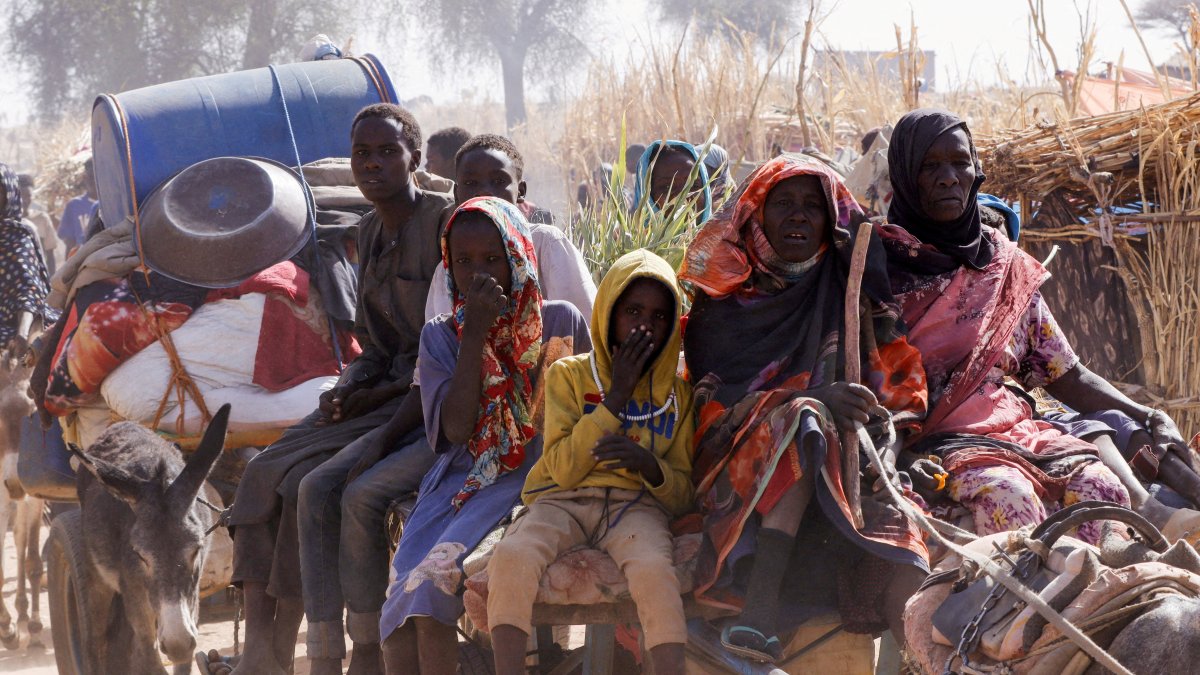 Displaced people ride a an animal-drawn cart, following Rapid Support Forces (RSF) attacks on Zamzam displacement camp, in the town of Tawila, North Darfur, Sudan, April 15, 2025. (Reuters Photo)
