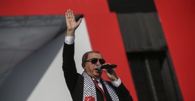 President Recep Tayyip Erdoğan salutes the crowd during a rally in solidarity with Palestinians, Istanbul, Türkiye, May 18, 2018. (AP Photo)